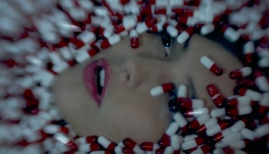 Macklemore Shines a Light on Addiction in New “Drug Dealer” Video